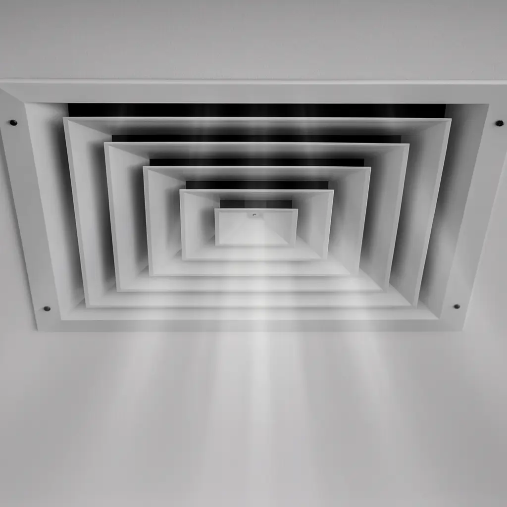 Clean air duct ceiling diffuser emitting fresh airflow from a sanitized HVAC system